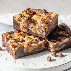 A tempting assortment of Brookies, capturing their irresistible appeal with layers of chocolate chip cookie and brownie dough, providing a heavenly treat that satisfies two cravings at once.