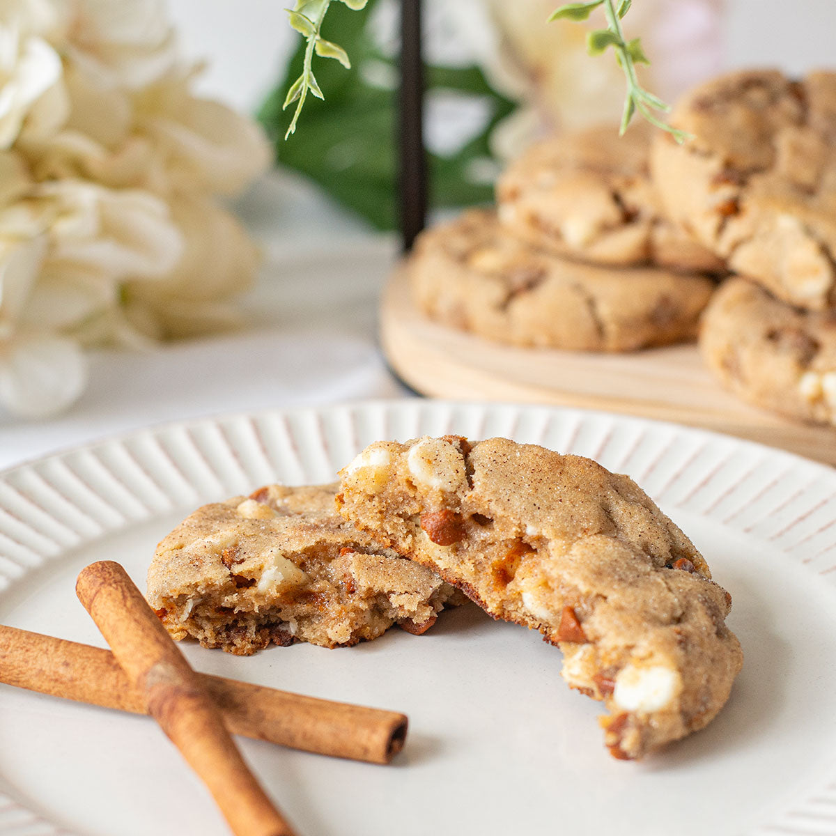 A delicious assortment of Cinnamon Lovers Cookies, showcasing their mouthwatering combination of cinnamon-infused dough, cinnamon chips, and white chocolate chips.