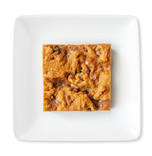 Soft Pumpkin Blondie with White and Semi-Sweet Chocolate Chips, Cinnamon Chips, Toffee Bits, and Caramel Swirl