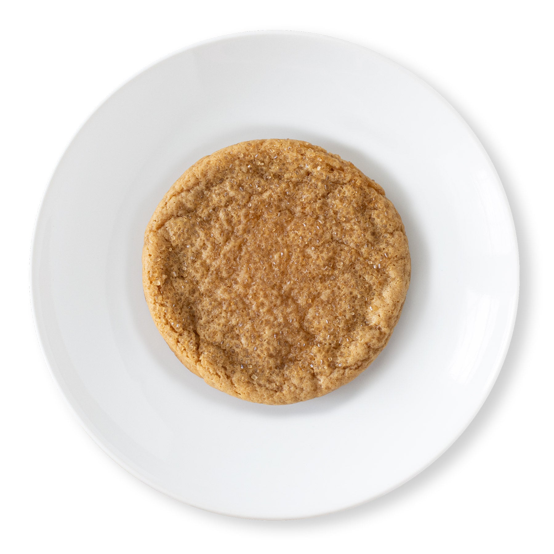 Top-down view of a Maple Sugar Cookie, showcasing its golden-brown surface with a light dusting of turbinado sugar, giving it a subtle, textured crunch.